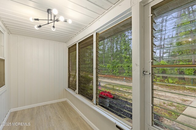 1034 Aberdeen Dr Unit E, Lakewood, NJ 08701 - unfurnished sunroom with a chandelier