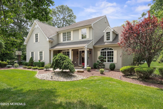 7 Oak Leaf Dr, Plumsted, NJ 08533 - traditional home featuring a porch, roof with shingles, and a front yard