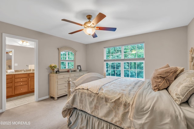 249 Chickadee Ct Unit 1000, Freehold, NJ 07728 - bedroom with multiple windows, light colored carpet, connected bathroom, and a ceiling fan