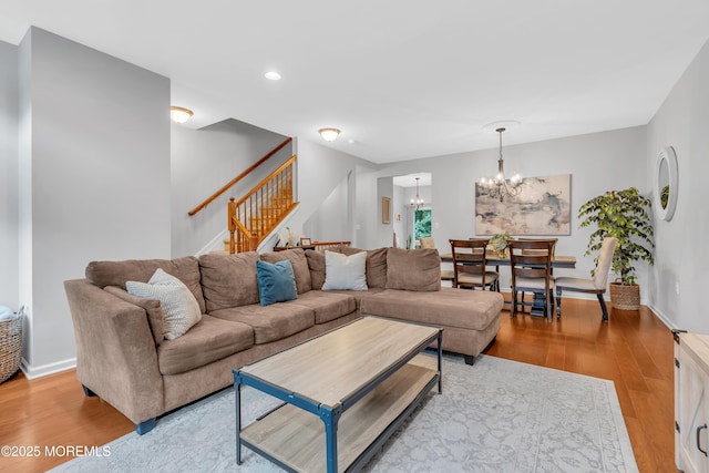 249 Chickadee Ct Unit 1000, Freehold, NJ 07728 - living room featuring a chandelier, wood finished floors, stairs, and recessed lighting