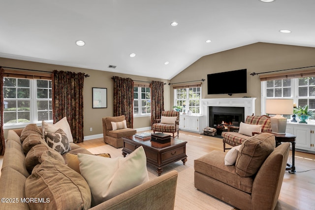 1 Van Cir, Rumson, NJ 07760 - living area featuring lofted ceiling, light wood finished floors, a lit fireplace, and recessed lighting
