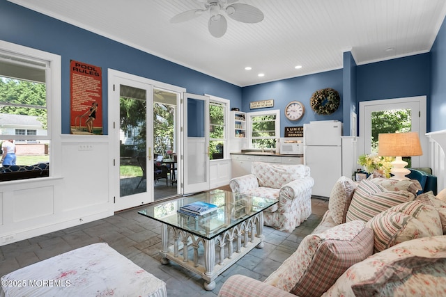 1 Van Cir, Rumson, NJ 07760 - living room featuring plenty of natural light, a decorative wall, a ceiling fan, wainscoting, and recessed lighting