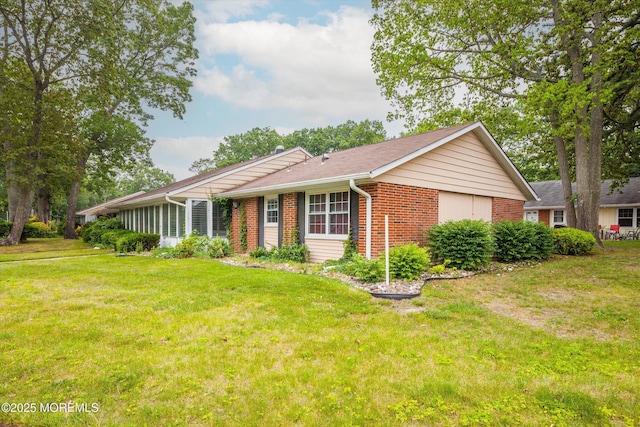 111 Edinburgh Ln Unit D, Lakewood, NJ 08701 - view of front of home with brick siding and a front yard