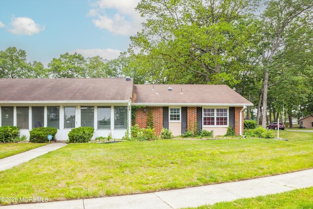 111 Edinburgh Ln Unit D, Lakewood, NJ 08701 - ranch-style house featuring a front yard and brick siding