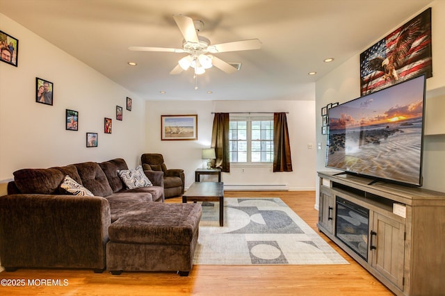 111 Edinburgh Ln Unit D, Lakewood, NJ 08701 - living room with ceiling fan, light wood finished floors, recessed lighting, and a baseboard radiator