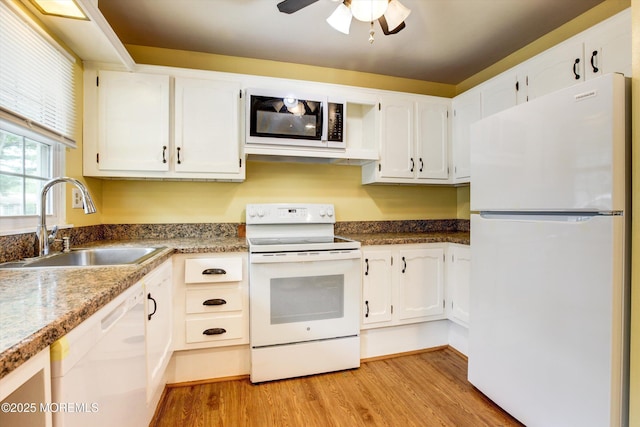 111 Edinburgh Ln Unit D, Lakewood, NJ 08701 - kitchen featuring white appliances, light wood-style floors, white cabinetry, and a ceiling fan