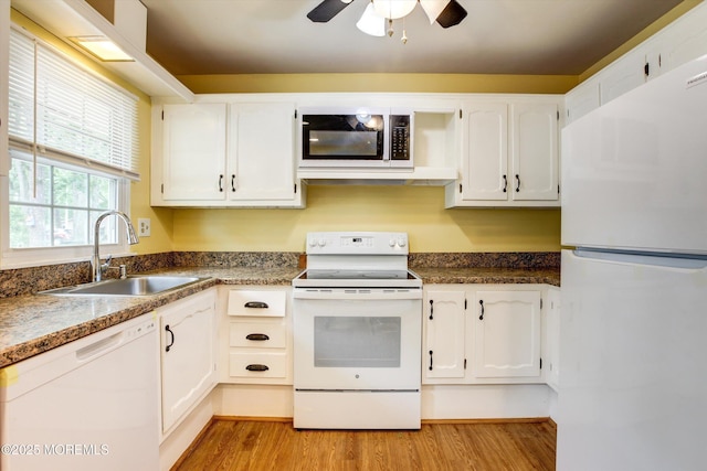 111 Edinburgh Ln Unit D, Lakewood, NJ 08701 - kitchen with white appliances, light wood-type flooring, white cabinets, and ceiling fan