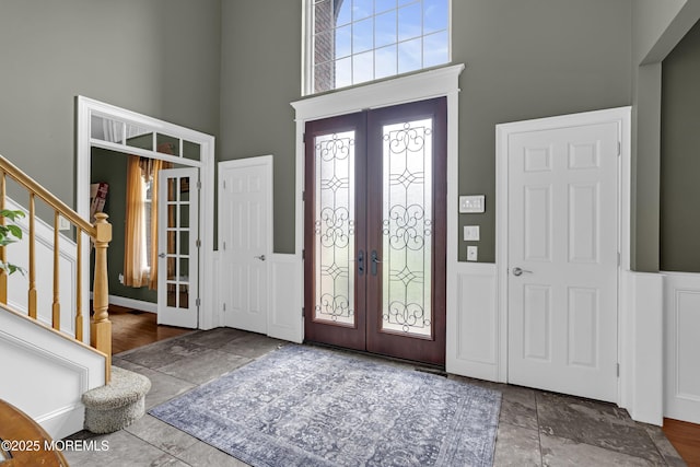 1020 Aumack Rd, Jackson, NJ 08527 - foyer entrance with a high ceiling, french doors, and stairway