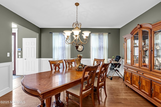1020 Aumack Rd, Jackson, NJ 08527 - dining room with a chandelier, wainscoting, and wood finished floors