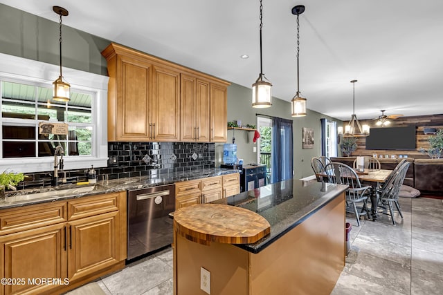 1020 Aumack Rd, Jackson, NJ 08527 - kitchen featuring stainless steel dishwasher, open floor plan, backsplash, a center island, and decorative light fixtures
