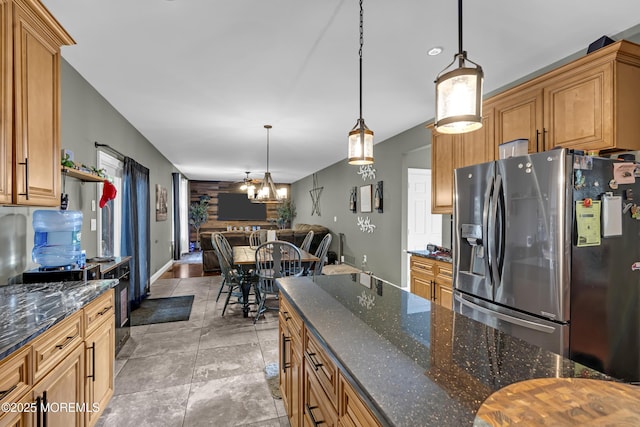 1020 Aumack Rd, Jackson, NJ 08527 - kitchen with stainless steel fridge with ice dispenser, open floor plan, decorative light fixtures, a chandelier, and dark stone counters