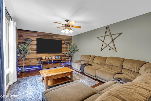 1020 Aumack Rd, Jackson, NJ 08527 - living room with ceiling fan, wooden walls, and wood finished floors