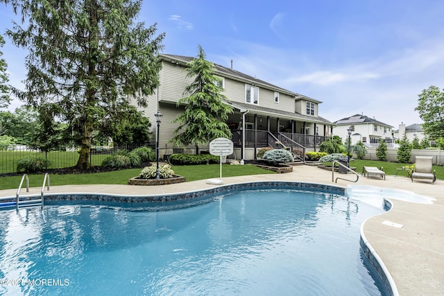 1020 Aumack Rd, Jackson, NJ 08527 - view of swimming pool with a sunroom, a patio, and stairs