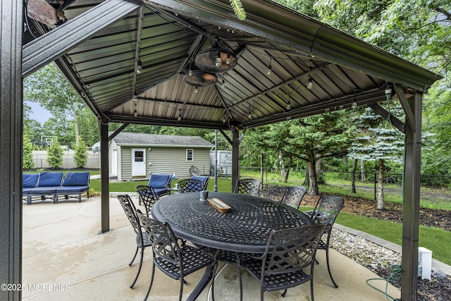 1020 Aumack Rd, Jackson, NJ 08527 - fenced backyard with outdoor dining area, a patio, a gazebo, a pool, and a shed