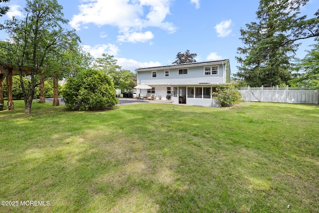 117 Greymoor Rd, Howell, NJ 07731 - rear view of property featuring a sunroom and a patio area