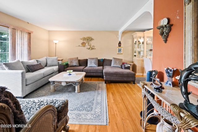 117 Greymoor Rd, Howell, NJ 07731 - living room featuring wood finished floors and arched walkways