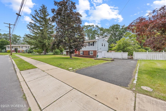 117 Greymoor Rd, Howell, NJ 07731 - view of front of property featuring brick siding and asphalt driveway