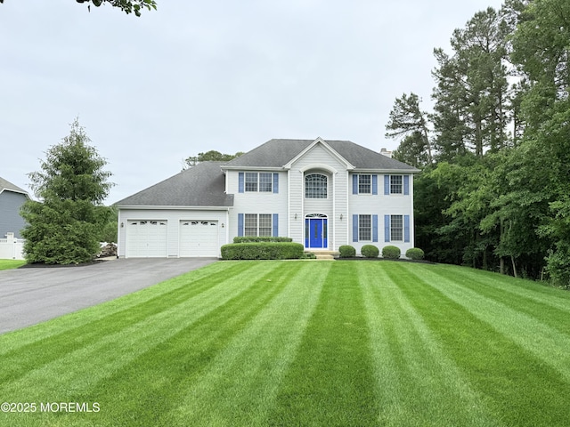 6 Eagle Ridge Ln, West Creek, NJ 08092 - colonial inspired home featuring driveway, a front lawn, a garage, and a chimney