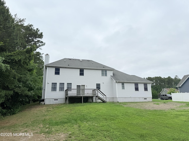 6 Eagle Ridge Ln, West Creek, NJ 08092 - rear view of property featuring a chimney, a yard, a wooden deck, stairs, and roof with shingles