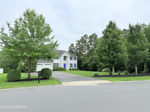 6 Eagle Ridge Ln, West Creek, NJ 08092 - colonial house with asphalt driveway and a front lawn