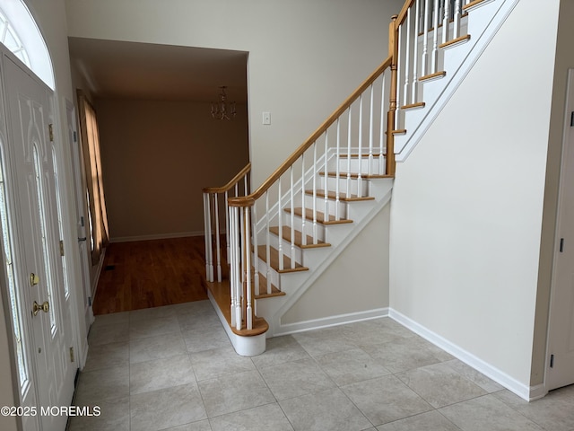 6 Eagle Ridge Ln, West Creek, NJ 08092 - tiled entryway featuring stairway and a chandelier