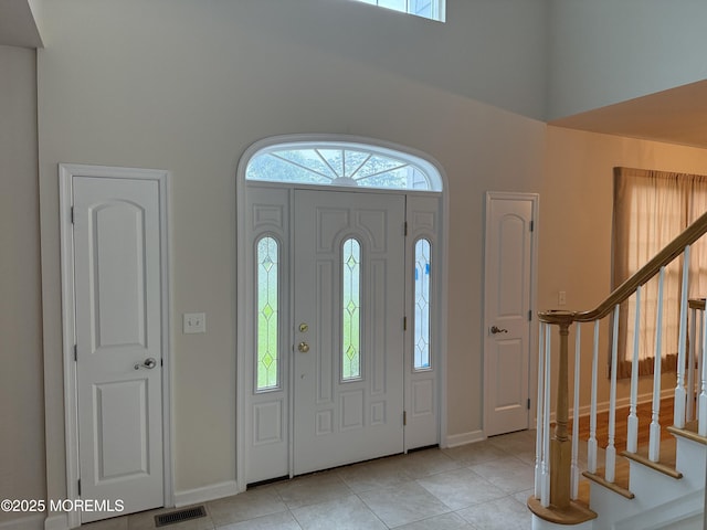 6 Eagle Ridge Ln, West Creek, NJ 08092 - entrance foyer featuring a towering ceiling, stairway, and light tile patterned flooring
