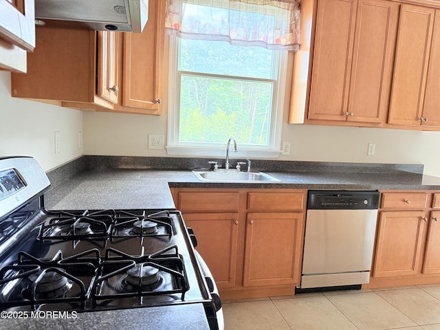 6 Eagle Ridge Ln, West Creek, NJ 08092 - kitchen with appliances with stainless steel finishes, dark countertops, and light tile patterned floors