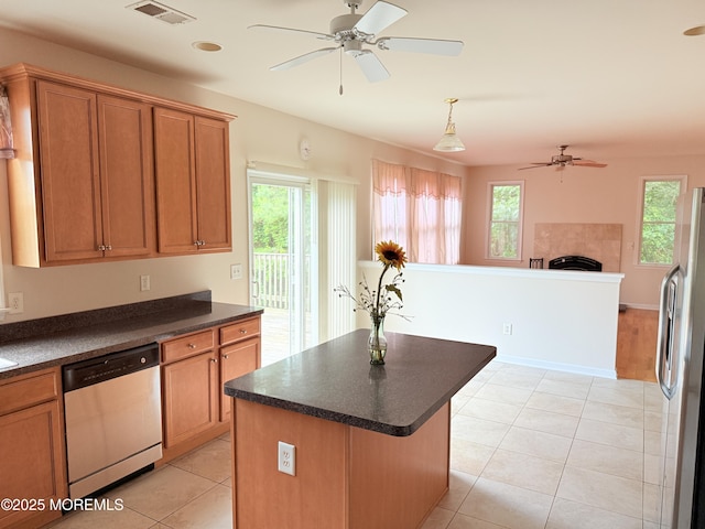 6 Eagle Ridge Ln, West Creek, NJ 08092 - kitchen with appliances with stainless steel finishes, a ceiling fan, dark countertops, and healthy amount of natural light