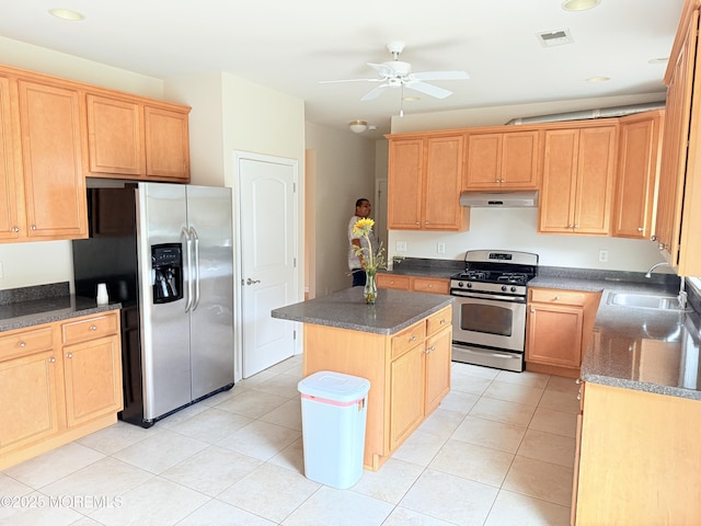 6 Eagle Ridge Ln, West Creek, NJ 08092 - kitchen with stainless steel appliances, under cabinet range hood, a ceiling fan, a center island, and light tile patterned flooring