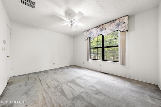 11 Old Orchard Ln, Ocean Twp, NJ 07712 - empty room featuring a textured ceiling, carpet flooring, and a ceiling fan