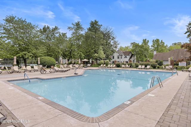 11 Old Orchard Ln, Ocean Twp, NJ 07712 - community pool with a patio area