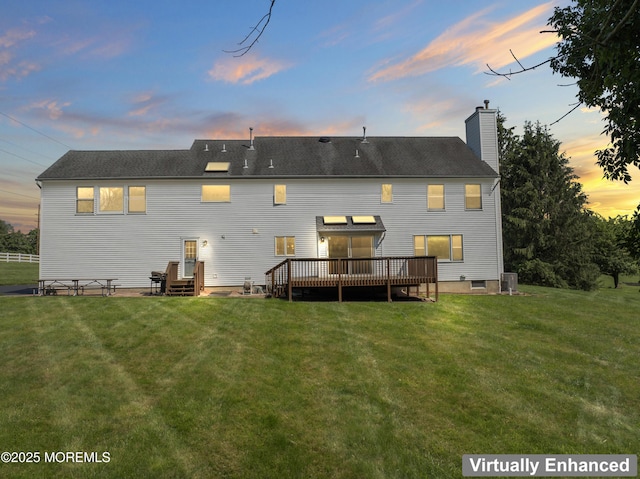 20 Birch Ln, Colts Neck, NJ 07722 - back of house at dusk with a yard, a wooden deck, and a chimney