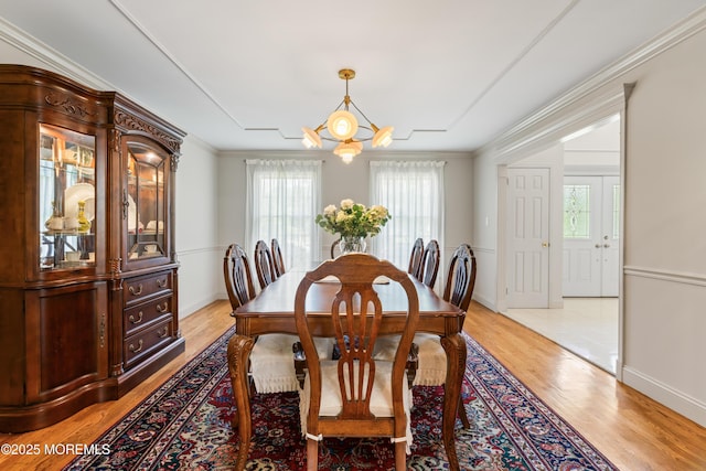 20 Birch Ln, Colts Neck, NJ 07722 - dining area with plenty of natural light, light wood-style floors, a chandelier, and crown molding