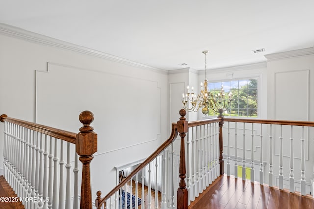 20 Birch Ln, Colts Neck, NJ 07722 - stairway with a chandelier, wood finished floors, and crown molding
