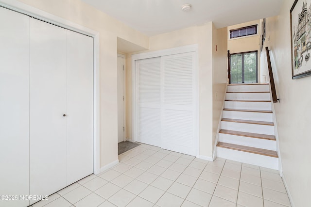 15 Haven Way, Keyport, NJ 07735 - staircase featuring tile patterned flooring and baseboards