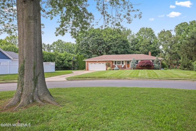 3 Mcelwaine Dr, Freehold, NJ 07728 - view of front of property with concrete driveway, a chimney, and an attached garage