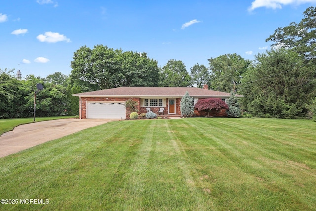 3 Mcelwaine Dr, Freehold, NJ 07728 - view of front facade featuring an attached garage, driveway, a front yard, a chimney, and brick siding