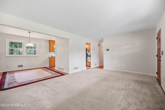 3 Mcelwaine Dr, Freehold, NJ 07728 - unfurnished living room with baseboards and light colored carpet