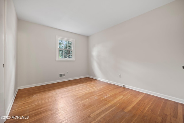 3 Mcelwaine Dr, Freehold, NJ 07728 - empty room featuring baseboards and light wood-style floors