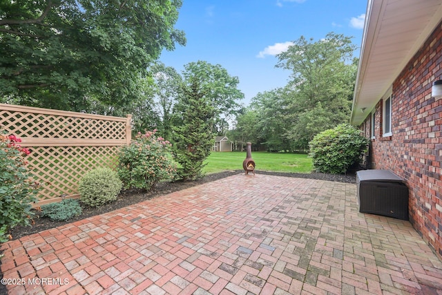 3 Mcelwaine Dr, Freehold, NJ 07728 - view of patio featuring a storage unit