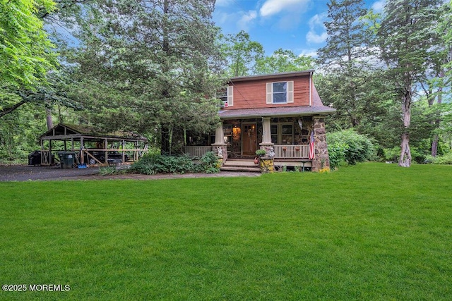 26 W Veterans Hwy, Jackson, NJ 08527 - view of front of home featuring covered porch, a front lawn, and stone siding