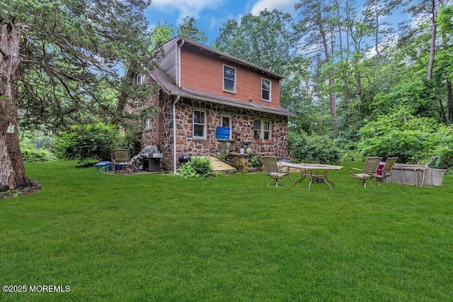 26 W Veterans Hwy, Jackson, NJ 08527 - back of property featuring stone siding and a lawn