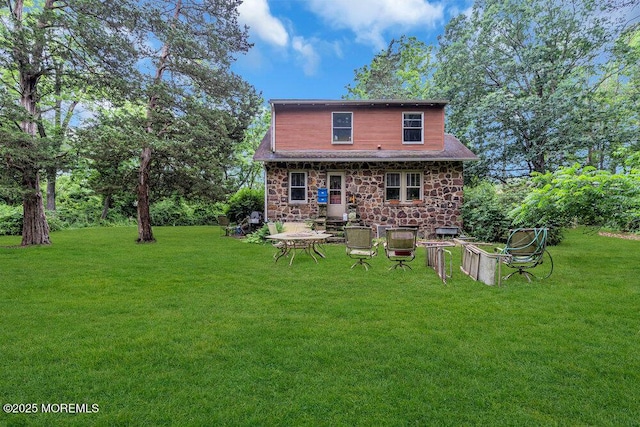 26 W Veterans Hwy, Jackson, NJ 08527 - rear view of house with a lawn and stone siding