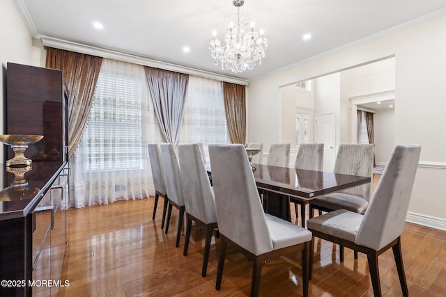 43 Shawnee Way, Morganville, NJ 07751 - dining space with crown molding, a chandelier, wood finished floors, and recessed lighting
