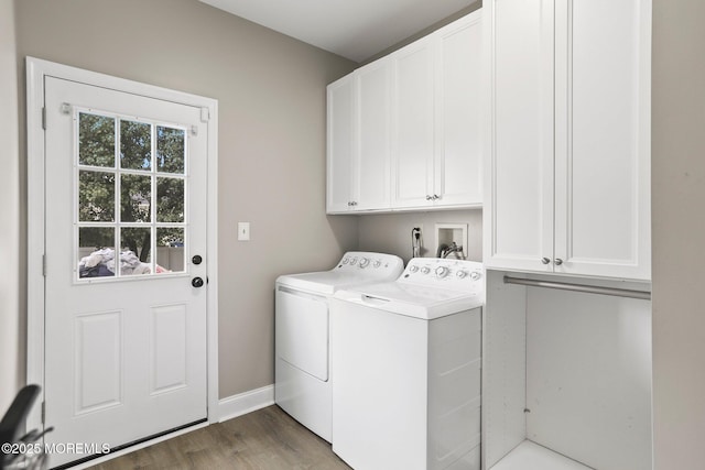 43 Shawnee Way, Morganville, NJ 07751 - laundry area with washer and dryer, cabinet space, and wood finished floors