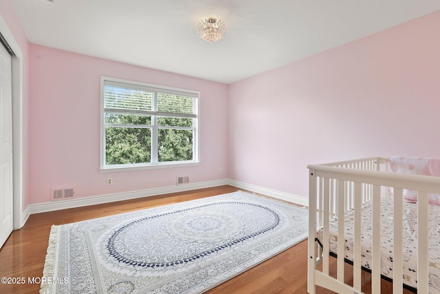 43 Shawnee Way, Morganville, NJ 07751 - bedroom featuring wood finished floors and baseboards