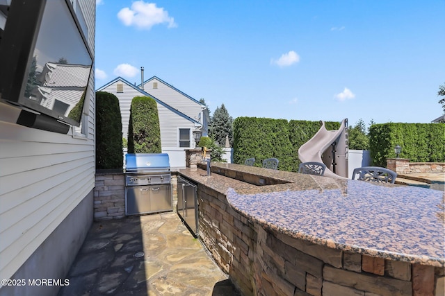 43 Shawnee Way, Morganville, NJ 07751 - view of patio featuring an outdoor kitchen