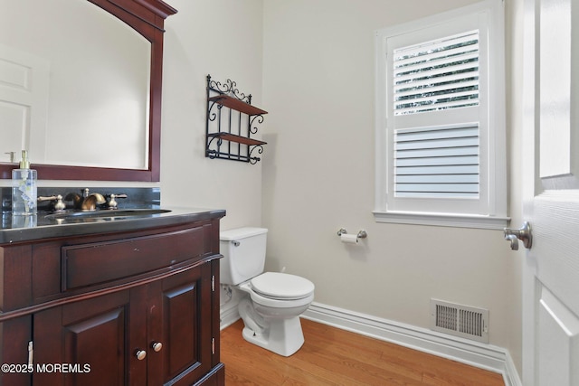 43 Shawnee Way, Morganville, NJ 07751 - half bathroom with wood finished floors and vanity