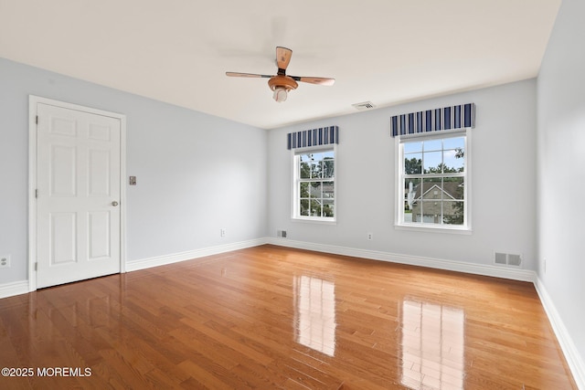 43 Shawnee Way, Morganville, NJ 07751 - unfurnished room with wood finished floors and ceiling fan