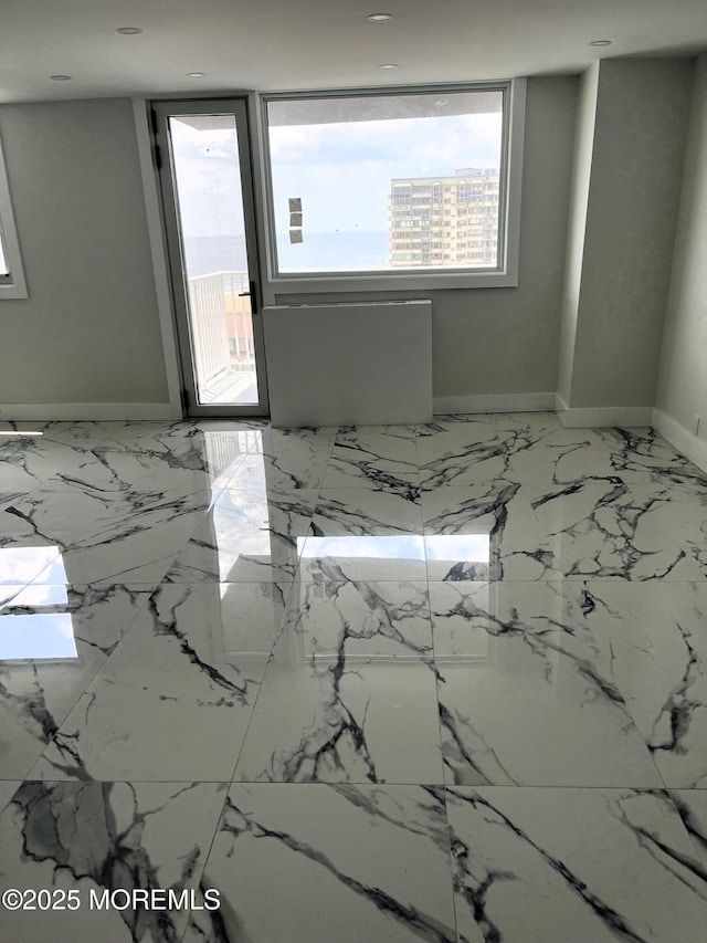 675 Ocean Ave # 9F, Long Branch, NJ 07740 - spare room with marble finish floors